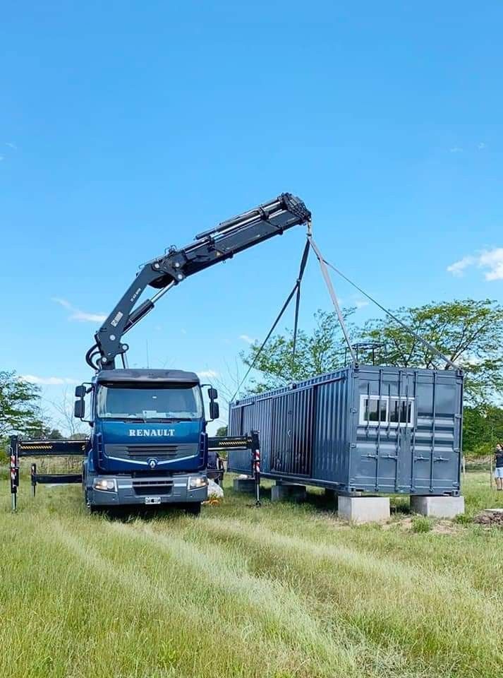 Crane delivery of shipping container